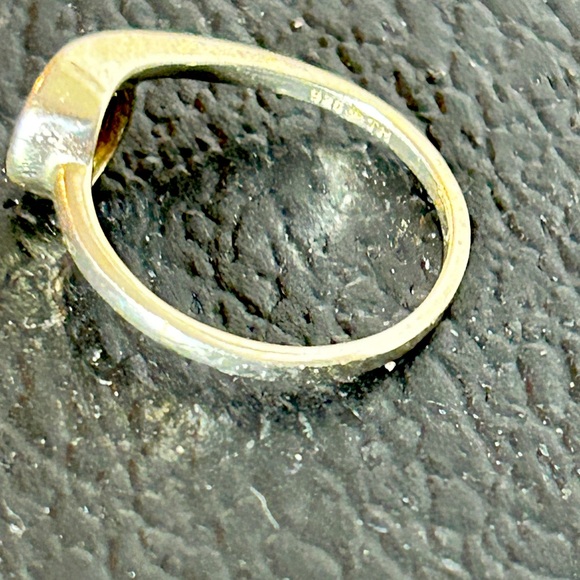 Sterling silver and aquamarine stone. It’s a size 8 in excellent condition. - Picture 4 of 5